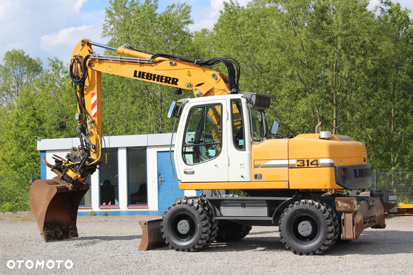 Liebherr A314 Rototilt Podpory Sprowadzony