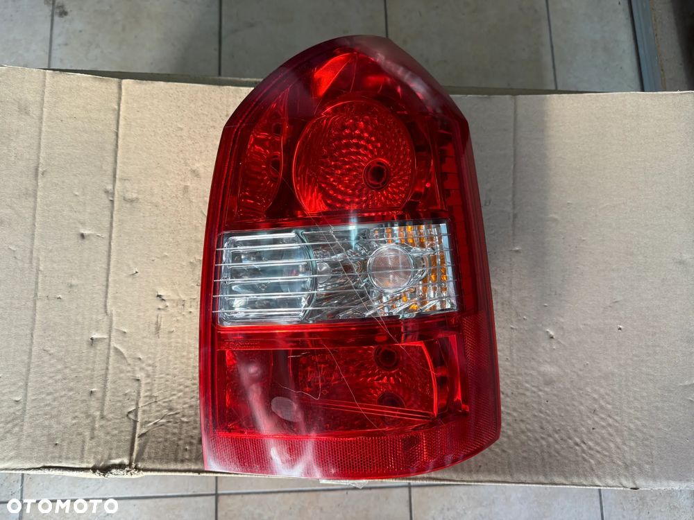 Reflektor / lampa tylna Hyundai Tucson I  - lewa strona - oryginalna - 1
