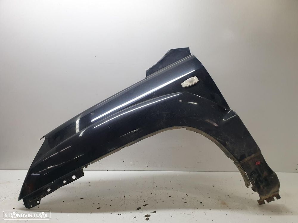 GUARDA-LAMAS FRENTE ESQUERDO KIA SPORTAGE KM - 1