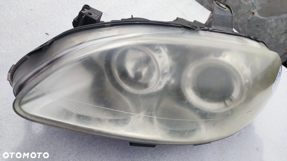 LAMPA LEWA REFLEKTOR LEWY FIAT CROMA 2 II XENON - 2