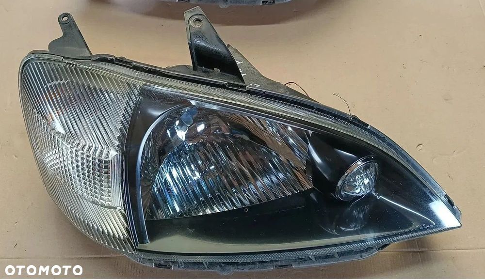 . Daihatsu YRV lampa przednia przód PRAWA stan bdb EU - 1