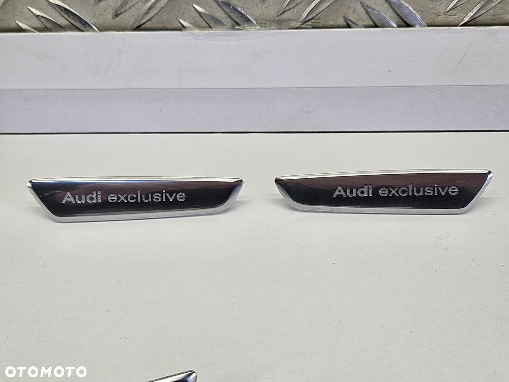 AUDI Q7 4L 05-15R ZNACZEK LOGO EMBLEMAT AUDI EXCLUSIVE PRAWY LEWY - 2