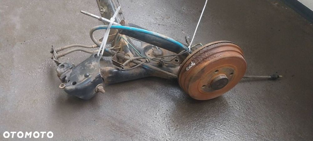 BELKA OŚ ZAWIESZENIA TYŁ BĘBNY Z ABS RENAULT CLIO III 1.5 DCI - 5