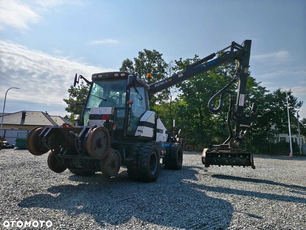 Caterpillar Caterpillar UNAC 300RR Mulczer kolejowy Liebherr atlas dwudrogowy zw - 2
