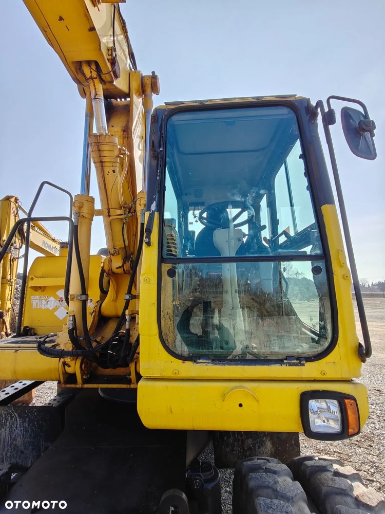 Komatsu PW140 - 18