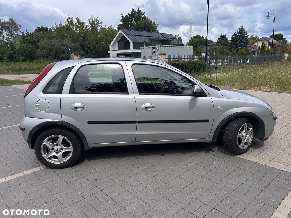 Opel Corsa 1.2 16V Cosmo - 8