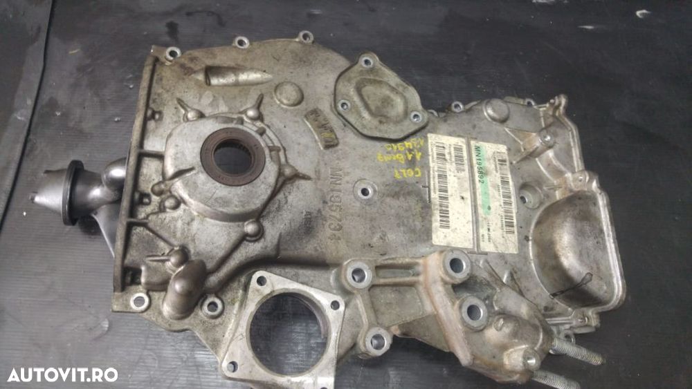 Capac distributie cu pompa ulei 1.1 b 134910 mitsubishi colt 6 mn195734 - 1