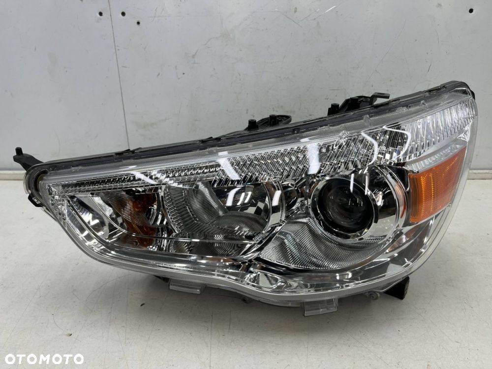 Lampa reflektor Mitsubishi ASX I Outlander Sport 10-19r. lewa przednia SOCZEWKA Europa oryginal - 1