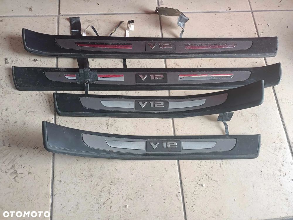 Listwy progowe BMW E65 760i V12 6.0 podświetlane Rarytas