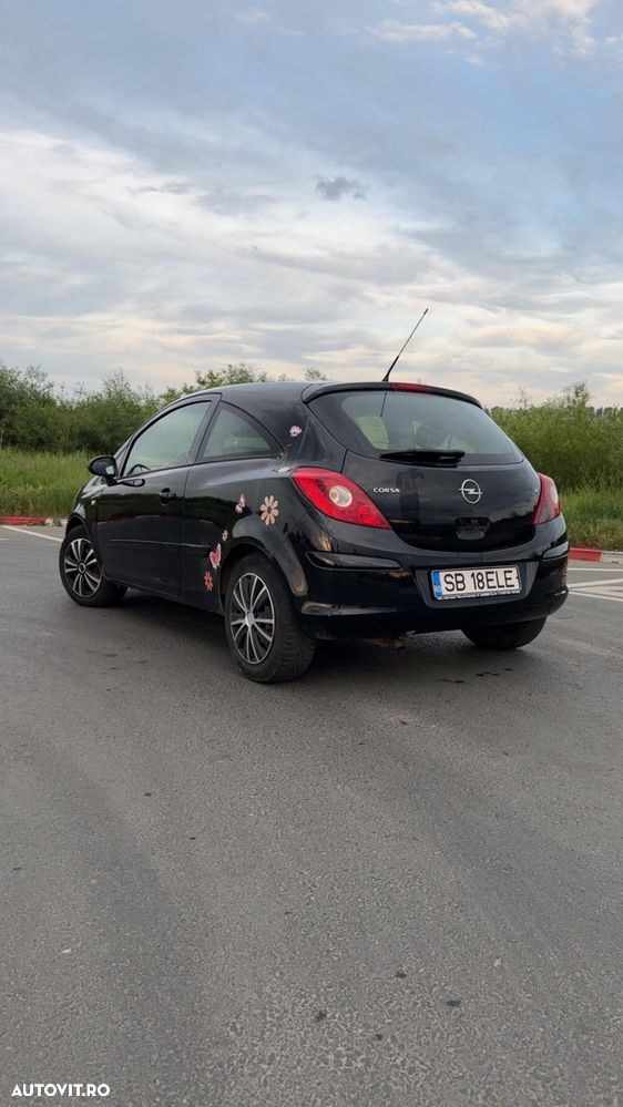 Opel Corsa 1.2i Cosmo - 4