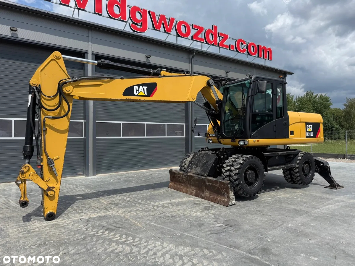 Caterpillar M318D - 3