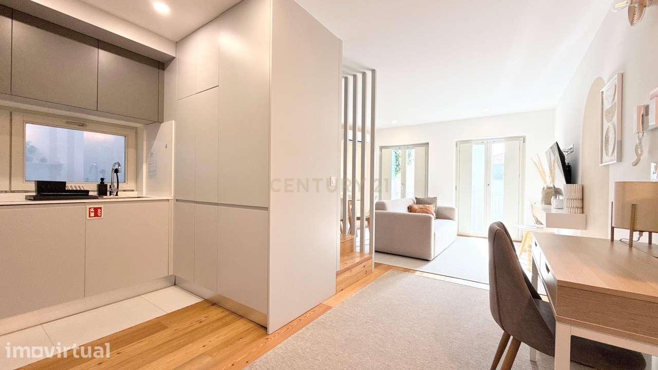 EXCLUSIVO T2 DUPLEX COM GARAGEM E VARANDA NO CORAÇÃO DA BAIXA DO PORTO - Grande imagem: 3/26