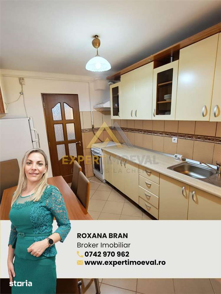 Apartament 3 camere decomandat 70 mp utili si garaj mare sub bloc — fotografia 1