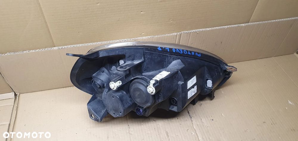 Lampa lewy przód przednia lewa Fiat Punto EVO - 7