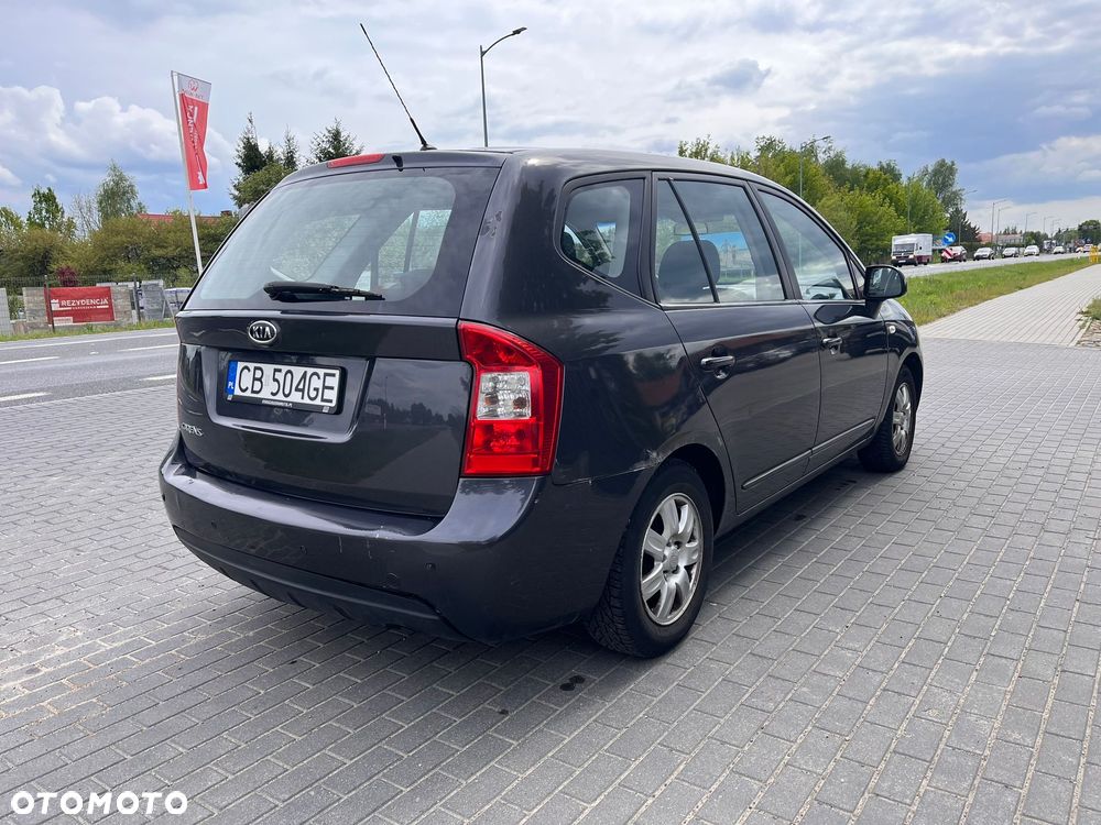 Kia Carens 2.0 CVVT LX - 11