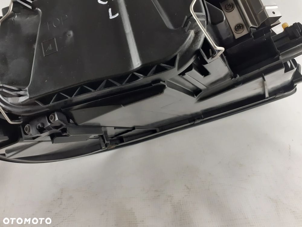 Volvo C70 06-10r Lampa lewa xenon - 7