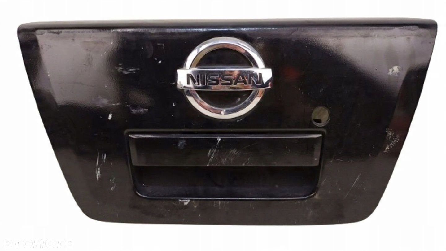 NISSAN NAVARA D40 ZAMEK KLAMKA MASKOWNICA BURTY TYLNEJ - 1