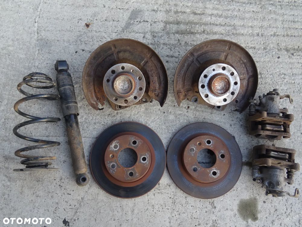 ZACISK HAMULCOWY TYŁ PRAWY LEWY LUCAS OPEL ASTRA H G ZAFIRA B A - 9