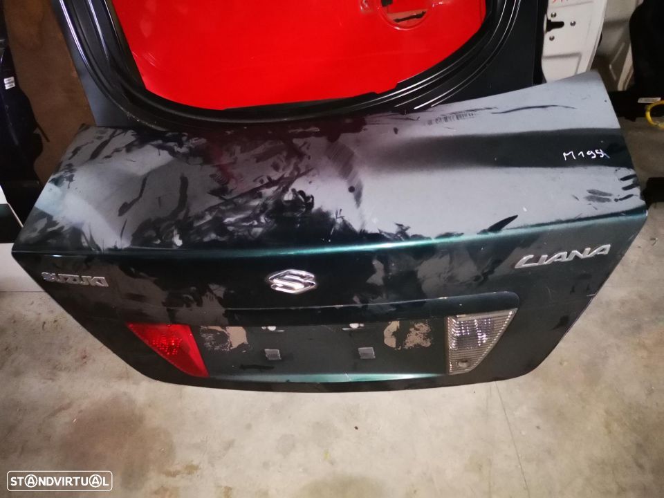 SUZUKI LIANA TAMPA DE MALA M195 - 1