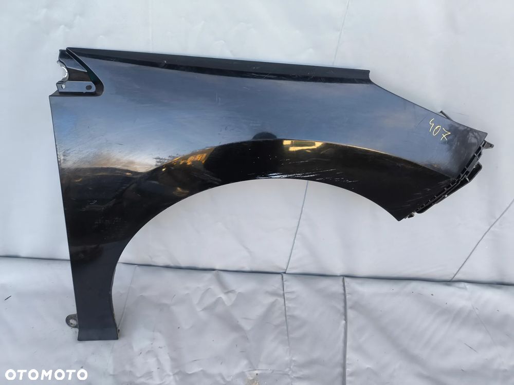 PEUGEOT 308 T7 BŁOTNIK PRAWY PRZEDNI