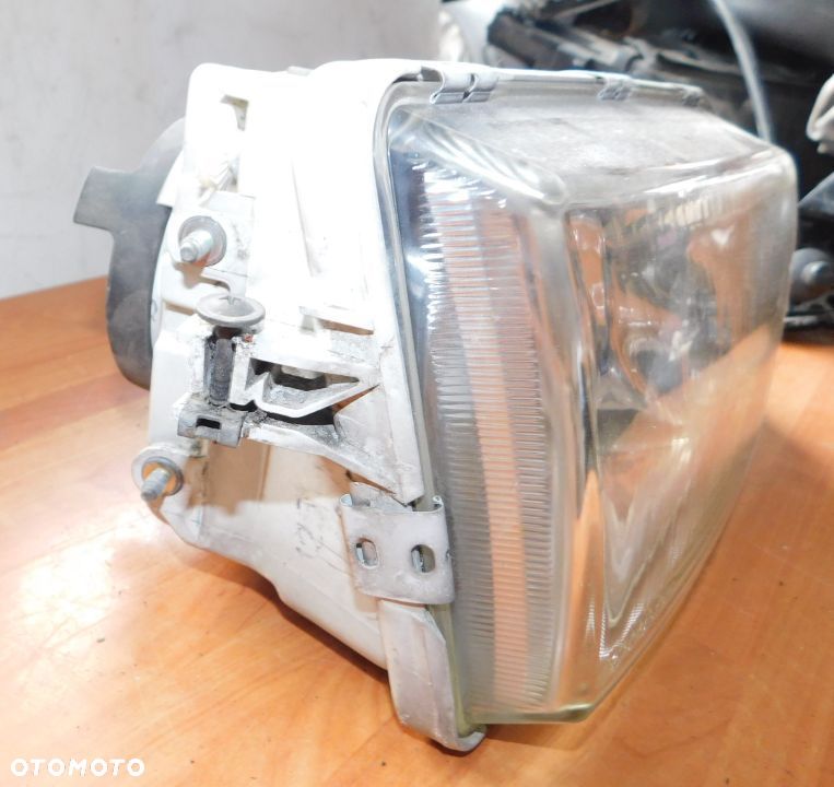 lampa prawa przód VOLVO S40 V40 99-04 lift EUROPA HELLA - 2
