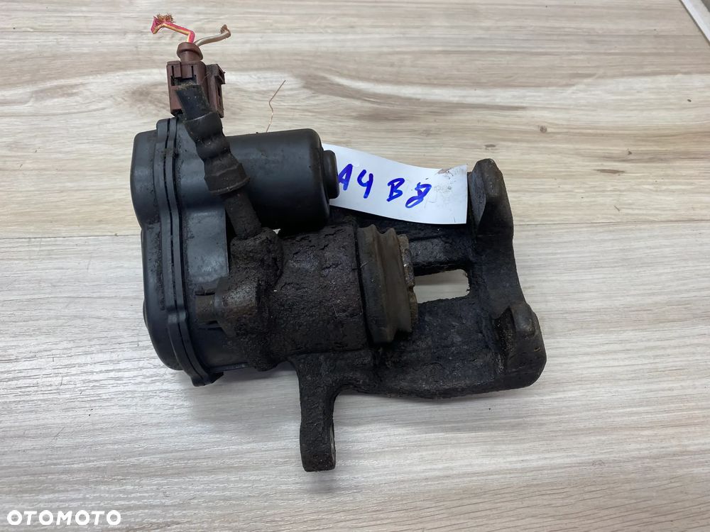 ZACISK HAMULCOWY ELEKTRYCZNY TYLNY  LEWY PRAWY AUDI A4 B8 - 1