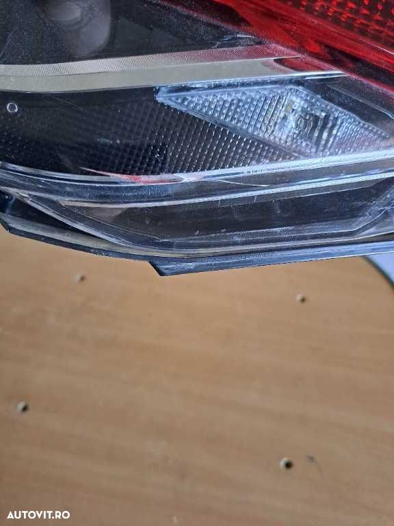 Stop stanga pe portbagaj Toyota Corolla E21 berlina an 2019-2022 - 2