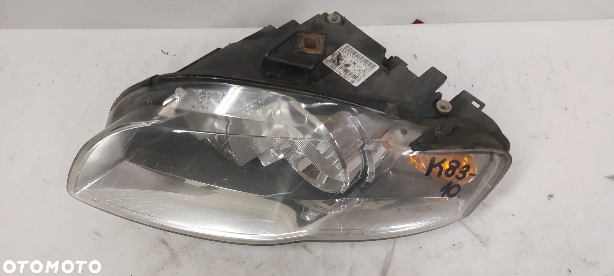 .  LAMPA PRZOD PRZEDNIA LEWA AUDI A4 B7 - 2
