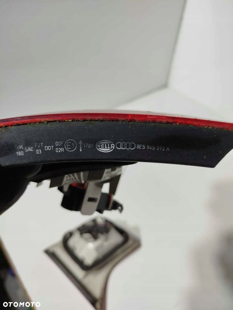 LAMPA LEWA TYLNA TYŁ AUDI A4 B7 W KLAPĘ 04-08 - 2