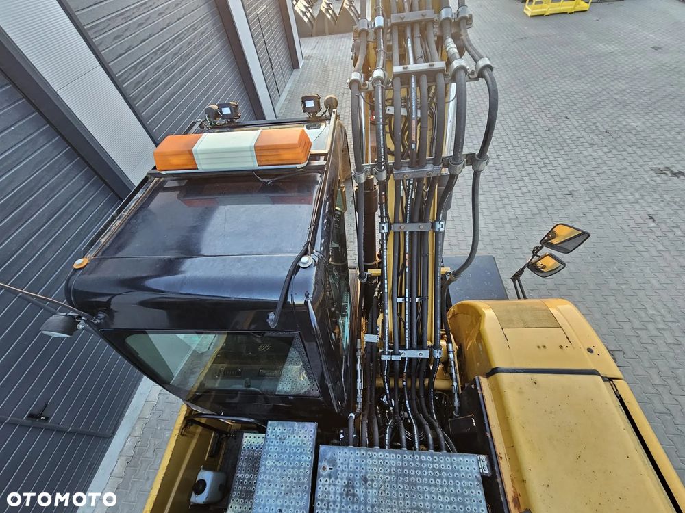 Caterpillar M313D - 16