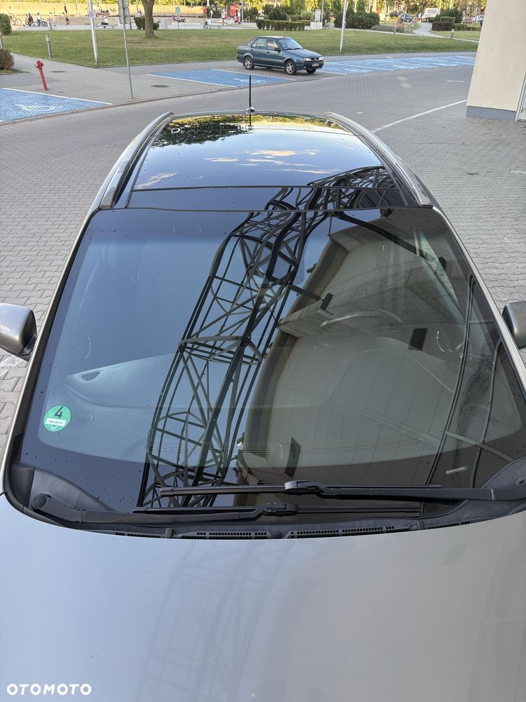 Kia Carens - 4