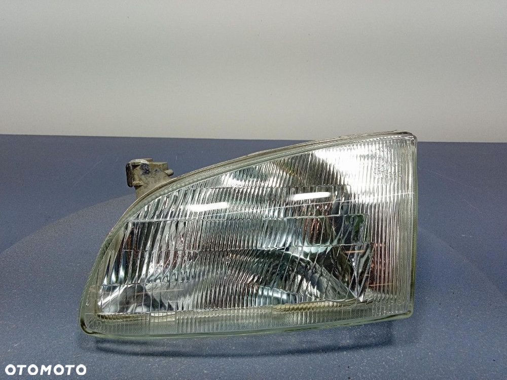 TOYOTA STARLET P9 REFLEKTOR LEWY 212-1169L - 1