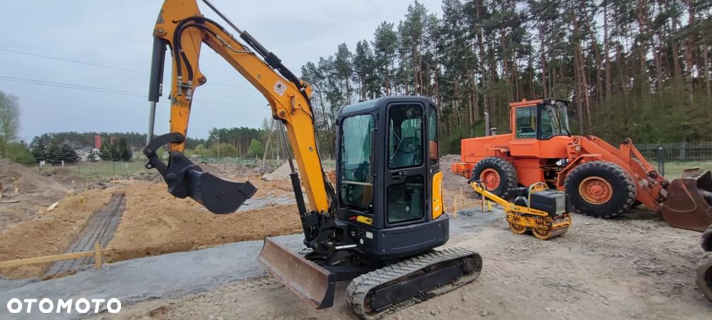 Bobcat E35, 3 łyżki