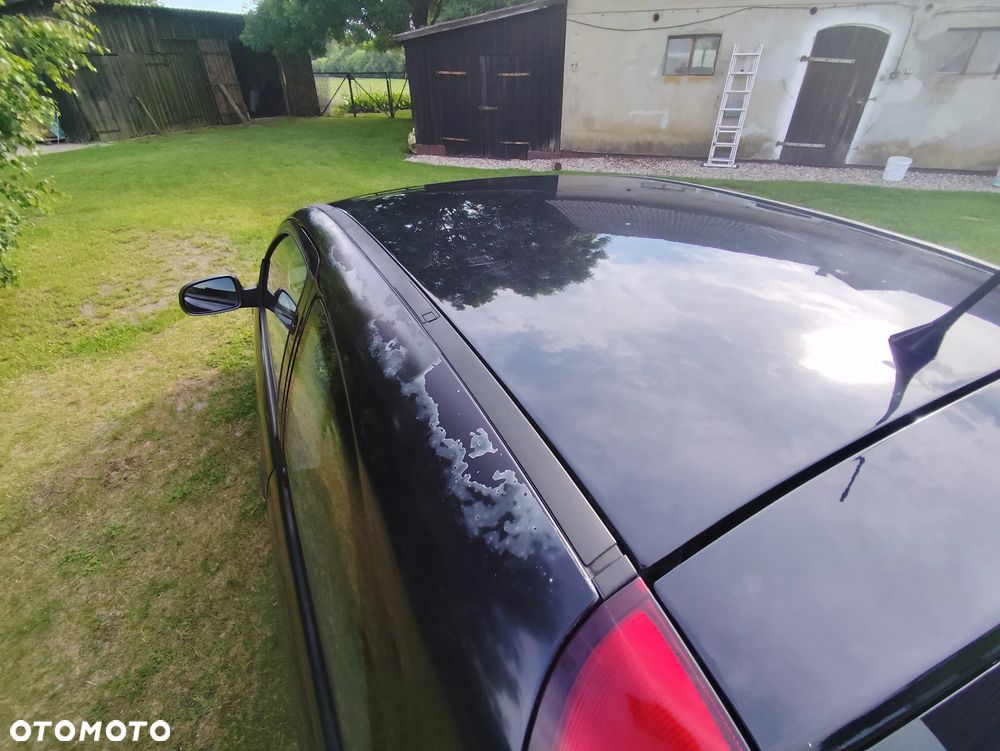 Opel Corsa 1.2 16V Cosmo - 7