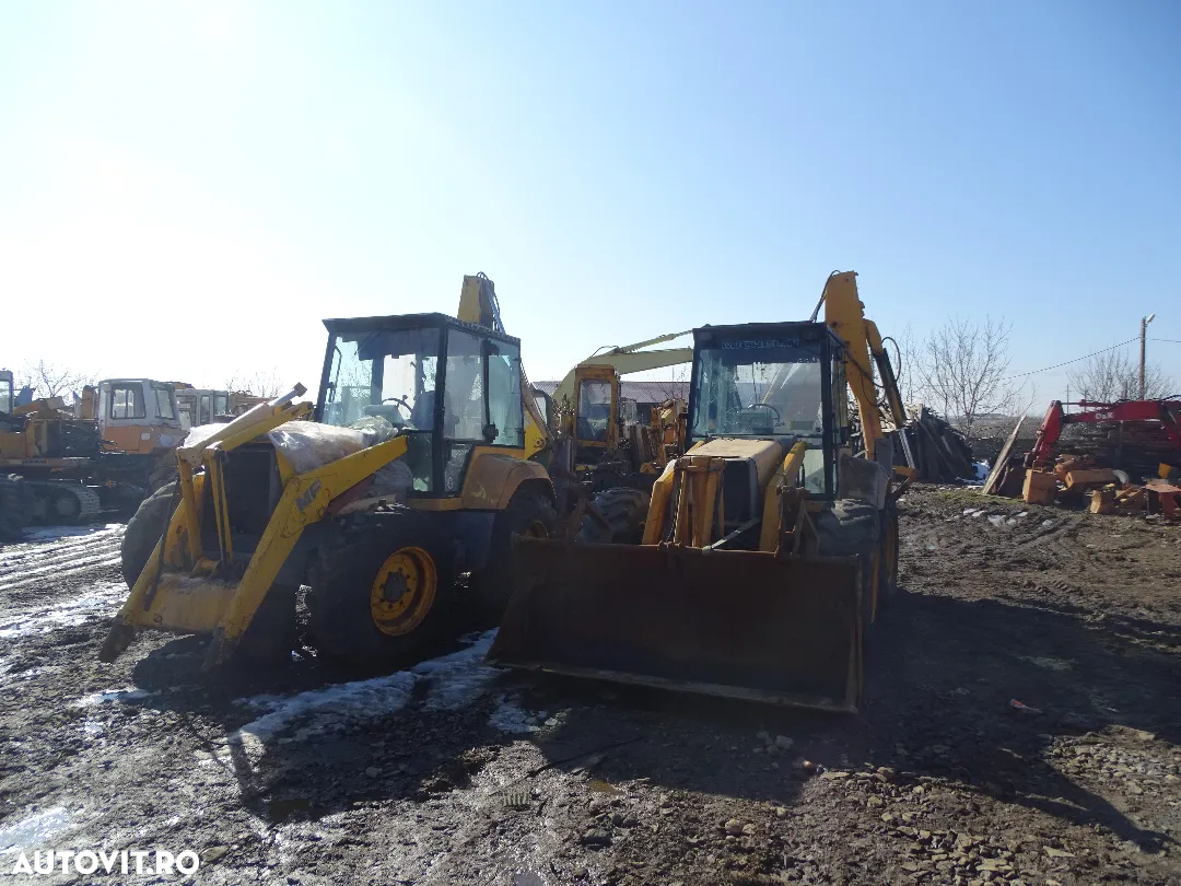 Dezmembrez buldoexcavator MF 965 - 7