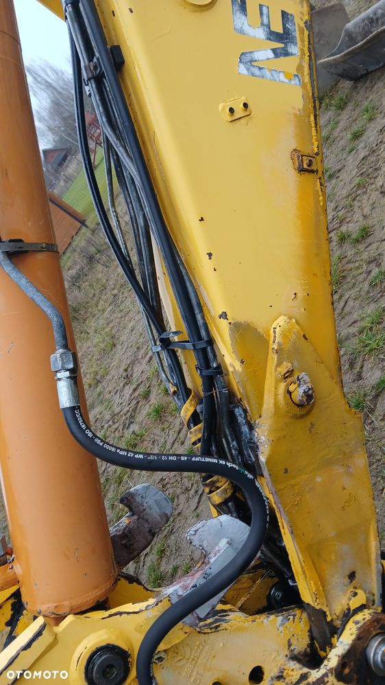 New Holland LB 115 - 31