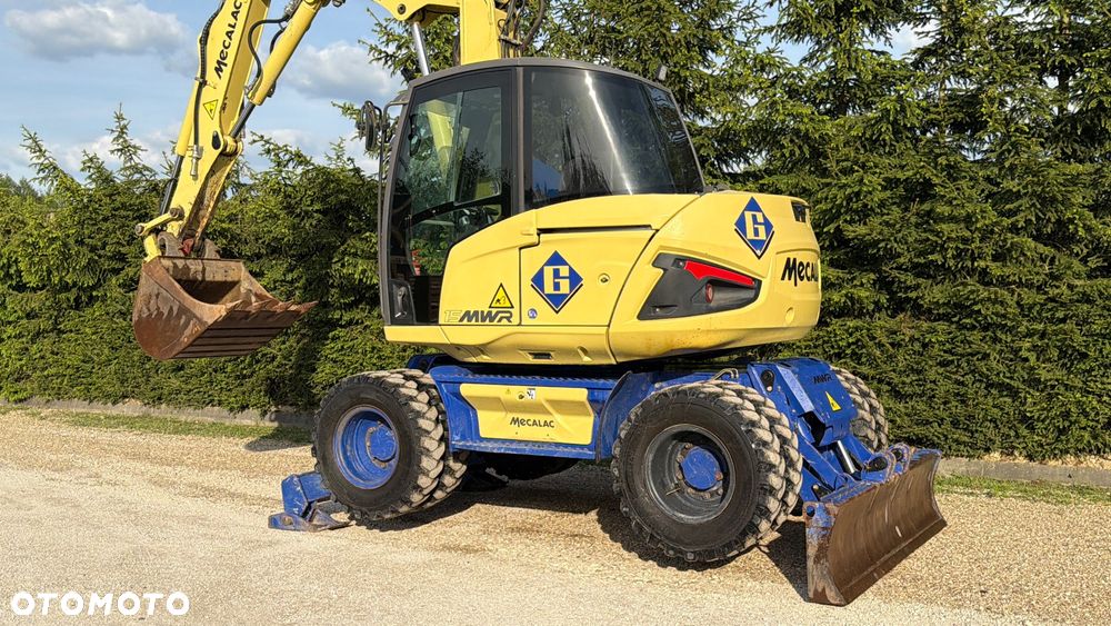 Mecalac Koparka 14 ton MECALAC 15 MWR koparko-ładowarka 3 łyżki widły 1 wł Centr.smarowanie Opony na BLIŹNIAKU 80%Camso ładowarka 714 12MTX 4x4 skrętne KLIMA kabina Premium silnik 146KM volvo EW140B DEUTZ szybka 35km/h - 21