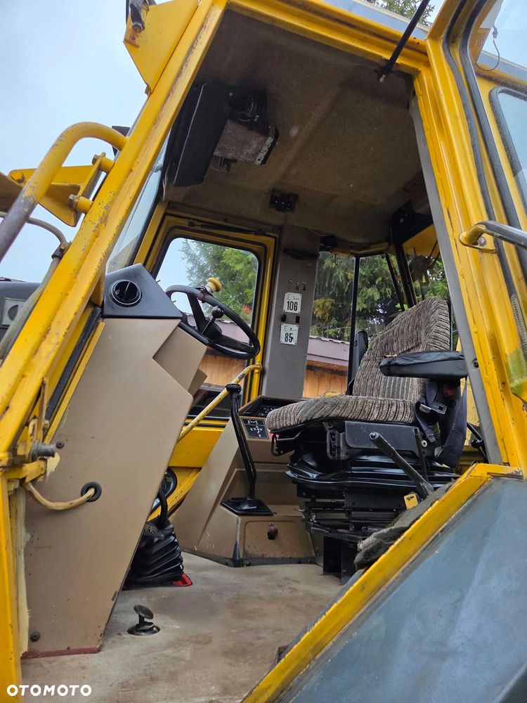 Caterpillar CAT 428B - 12