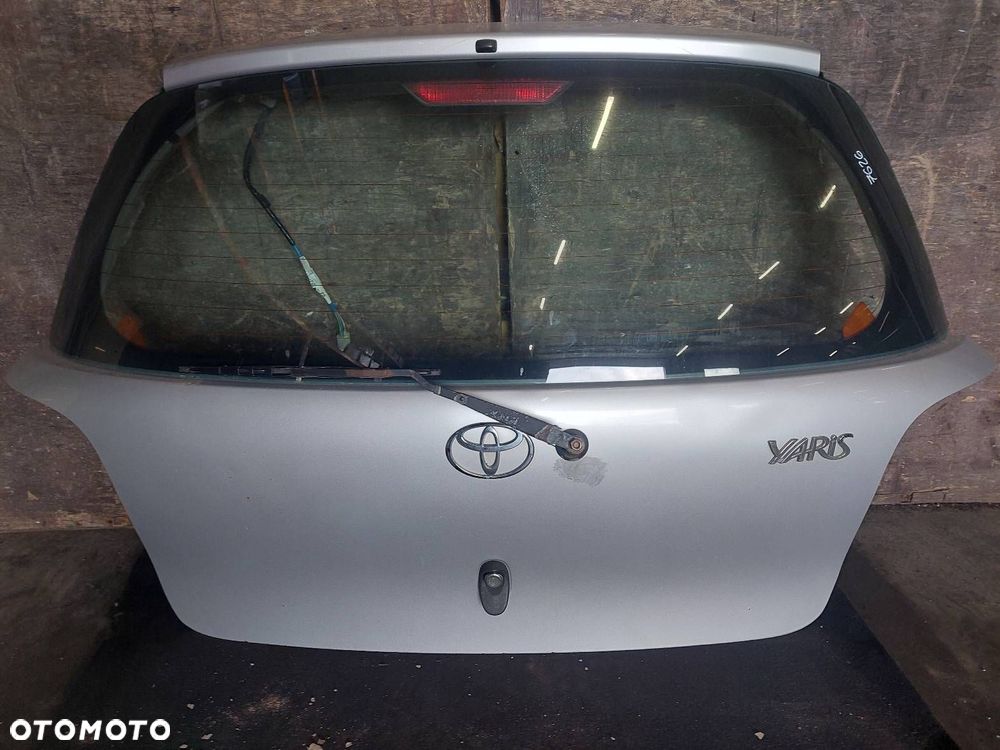 KOMPLETNY TYŁ KLAPA BAGAŻNIKA ZDERZAK TYŁ LAMPY TOYOTA YARIS I LIFT 1E7 - 12