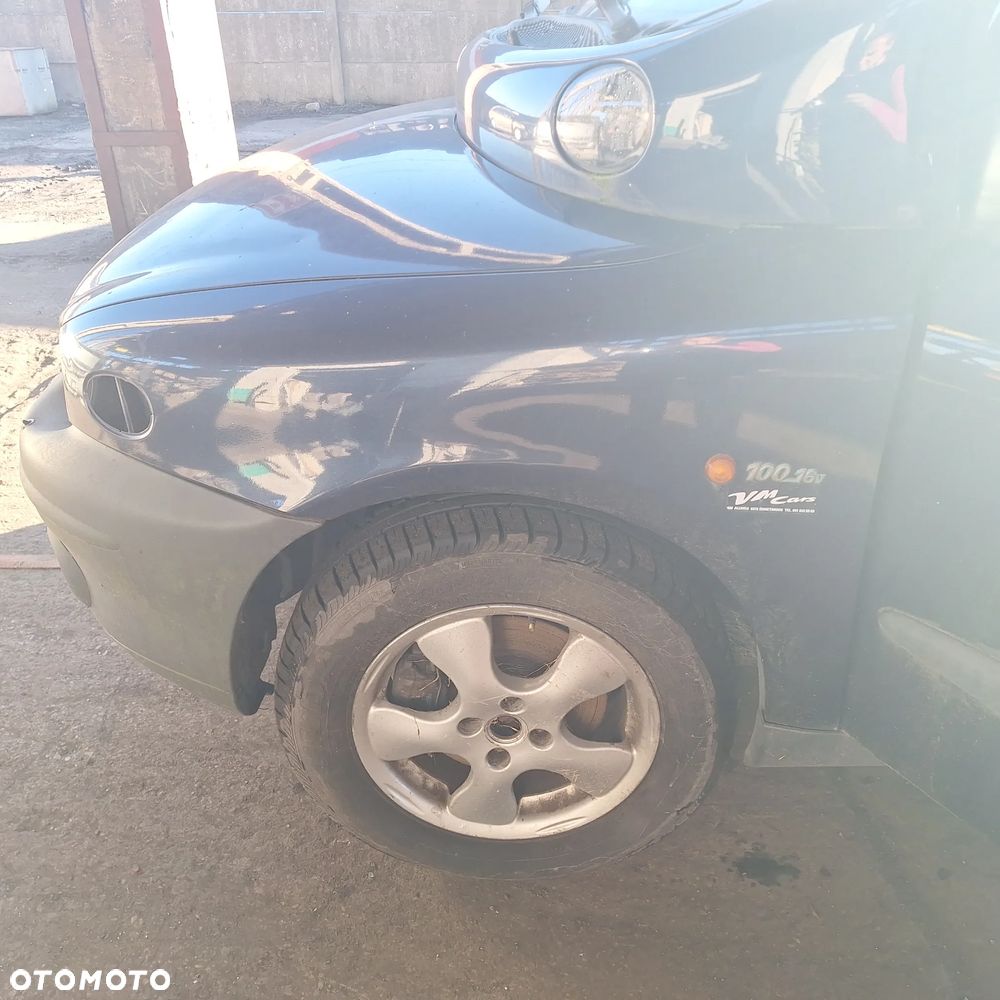 MASKA ZDERZAK DRZWI BLOTNIK LAMPY SZYBA CZESCI MULTIPLA 339/7 - 8