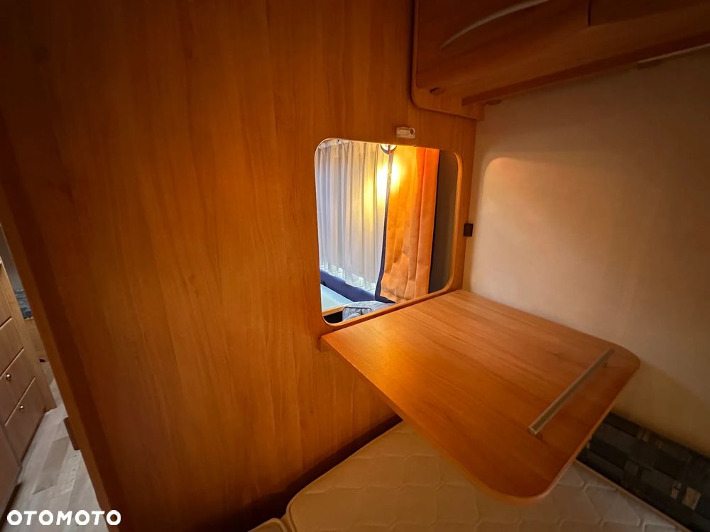 Adria ADORA 542 TK z przedsionkiem Isabella i łóżkami piętrowymi. - 28