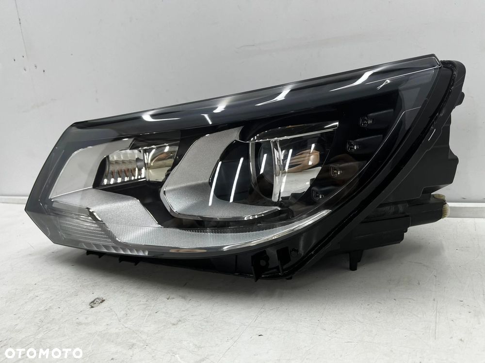 Lampa reflektor VW Tiguan 1 I 5n LIFT 10-16r. lewa przednia XENON EU skrętna doświetlanie zakrętów + - 3