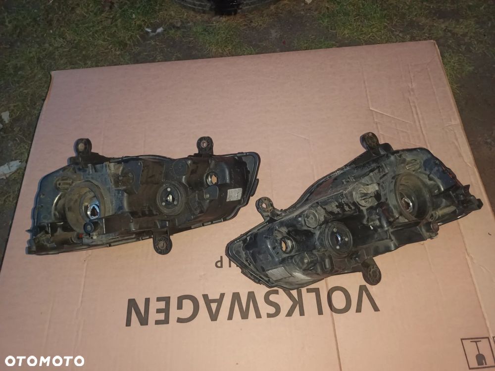 CHRYSLER VOYAGER 2011- lampa prawa lewa przód przednia org, Europa - 2