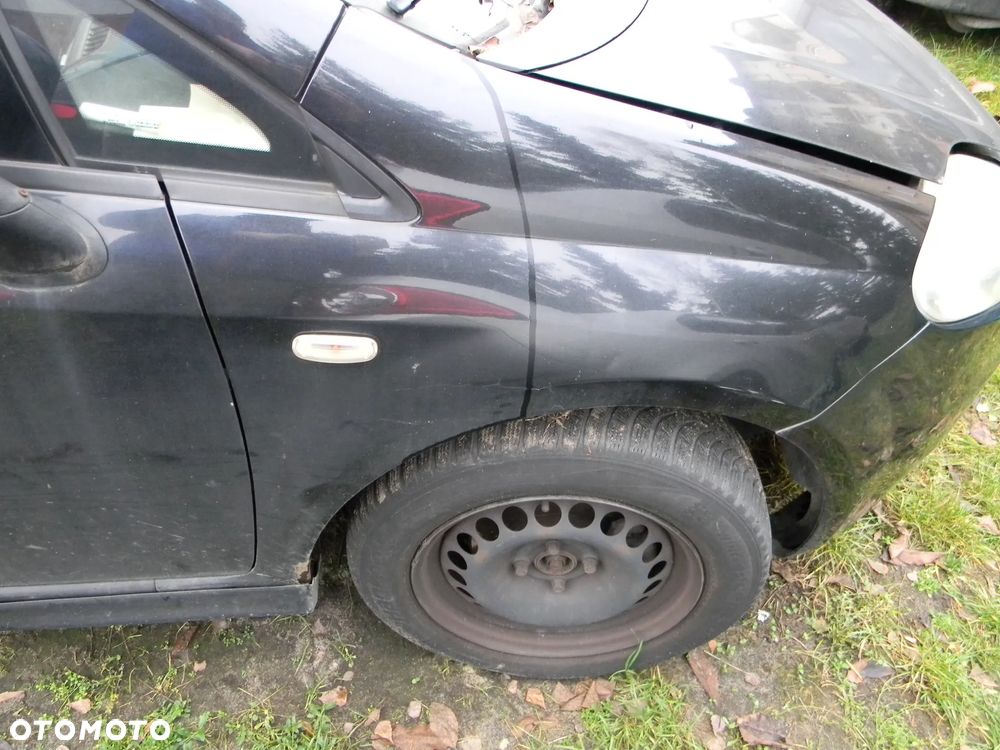 FIAT GRANDE PUNTO błotnik prawy przód 891/B - 1