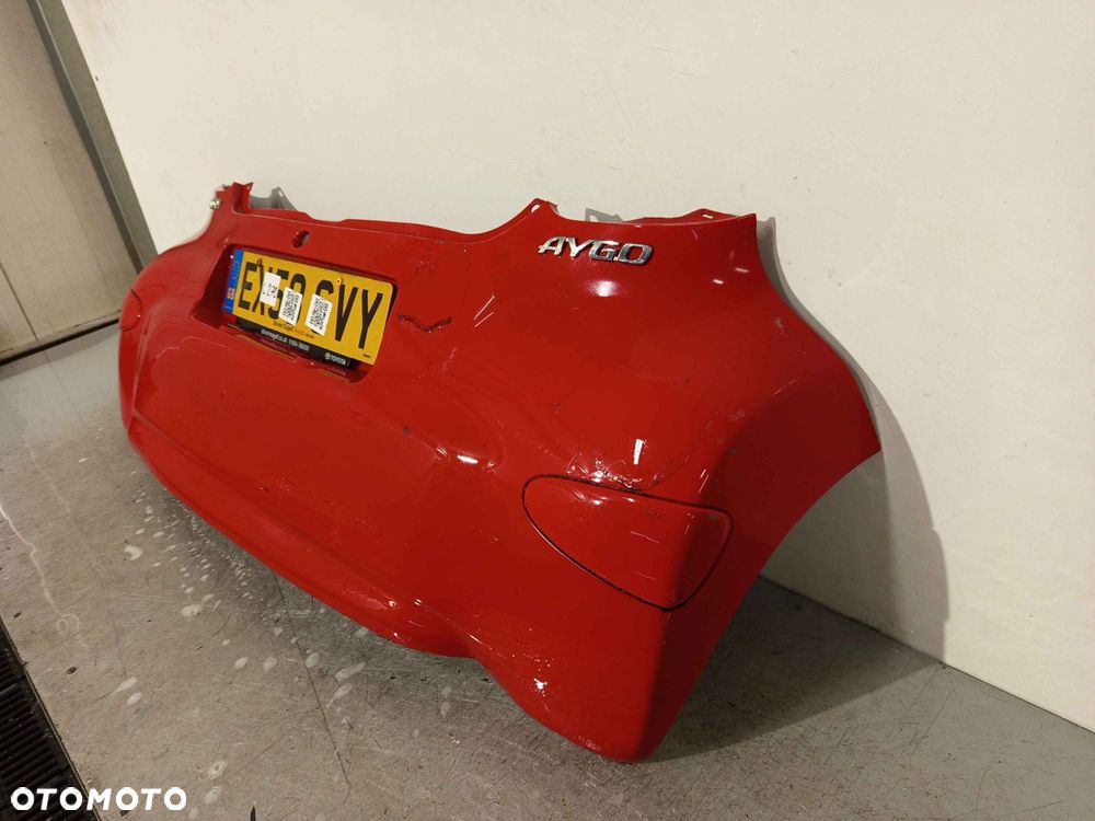 ^ ZDERZAK TYŁ TYLNY TOYOTA AYGO I 1 3P0 CZERWONY - 2