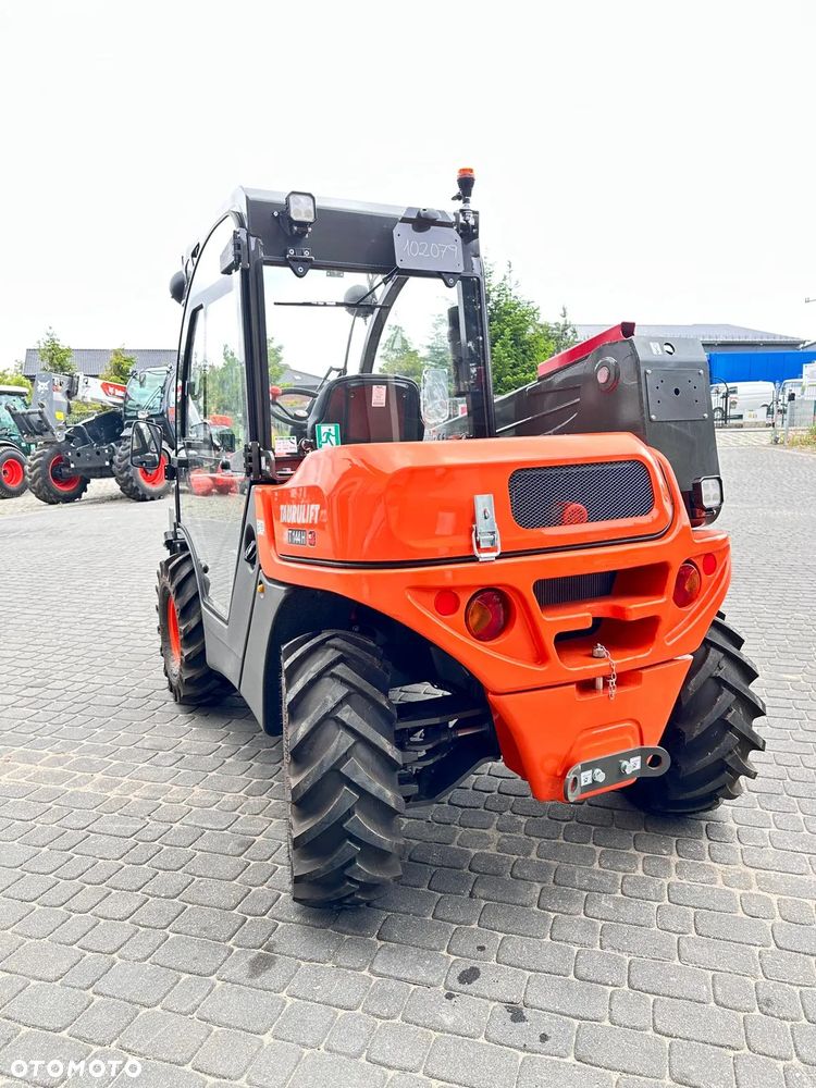 Ausa T144H - 9