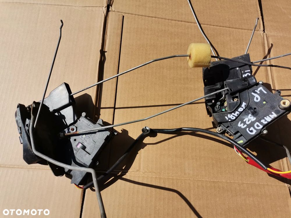 Zamek drzwi prawy lewy przod tyl MAZDA 323F BJ - 2