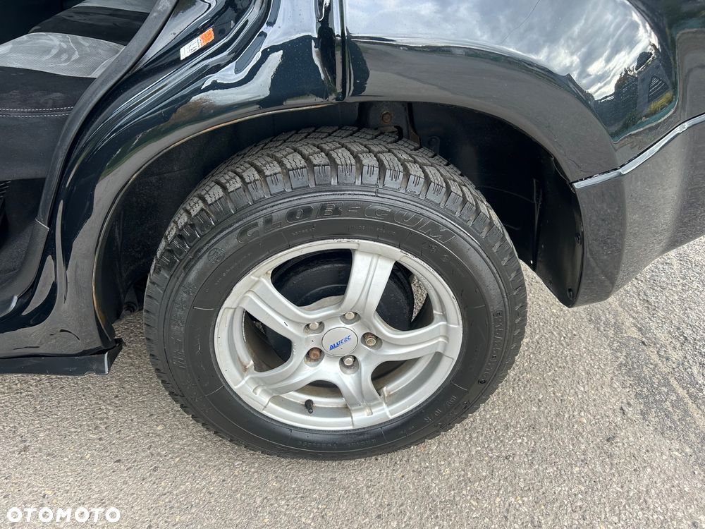 Suzuki Grand Vitara 2.0 - 11