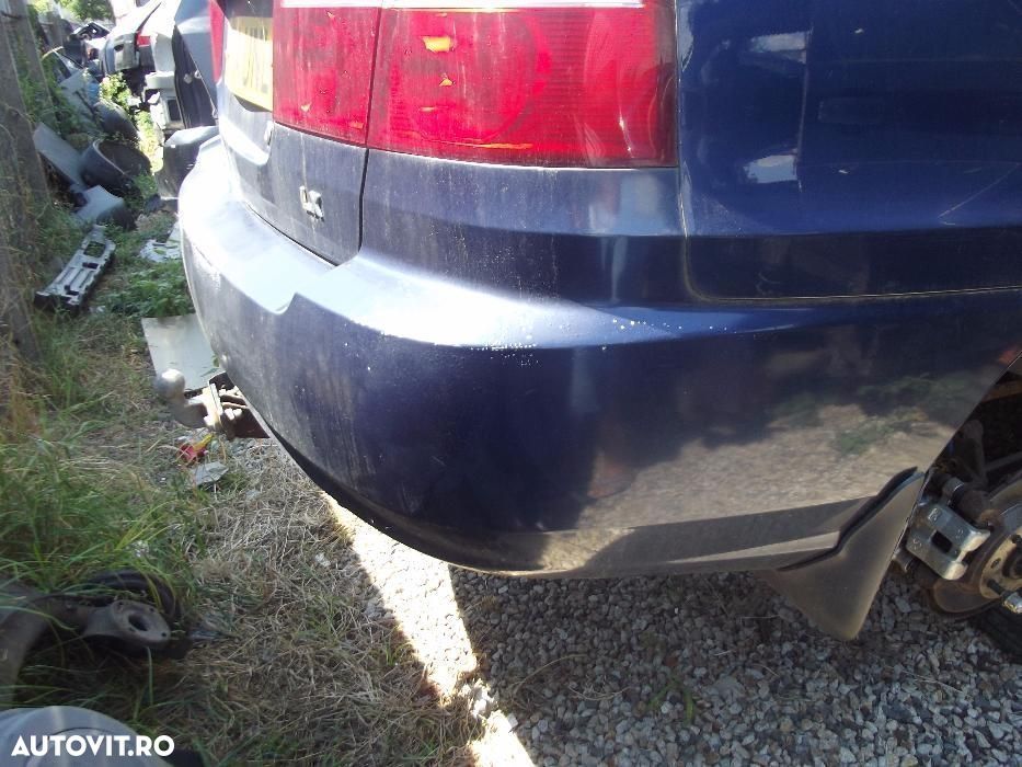 Bara spate Kia Carens spoiler spate kia Carens dezmembrez Carens 2.0 - 3