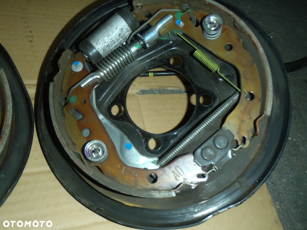 bęben szczęki cylinderek rozpierak hamulec tylny osłona tarcza kotwiczna kostka abs z zawieszenie tył toyota yaris II III 2 3 jak nowe - 18